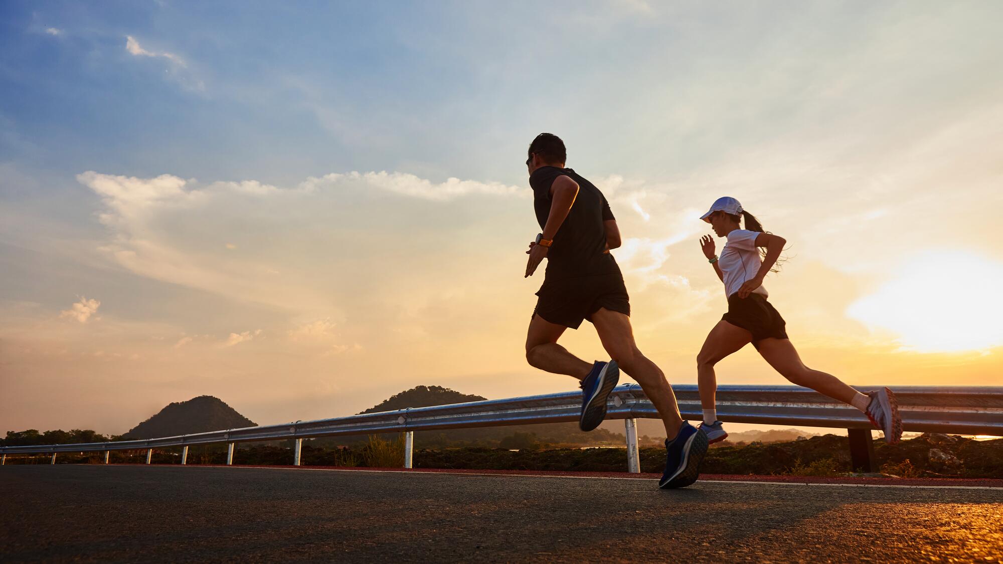 young fit couple running