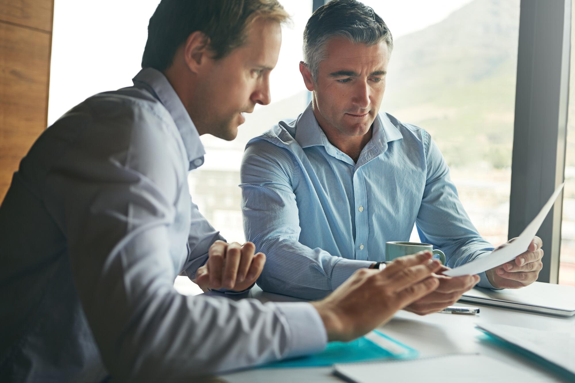 professionals discussing financial data
